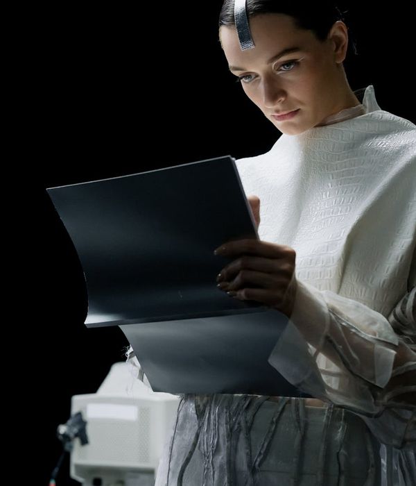 Expert diagnostic technician using advanced testing systems