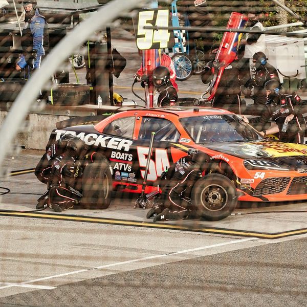 Mobile field service technician performing on-site vehicle repair